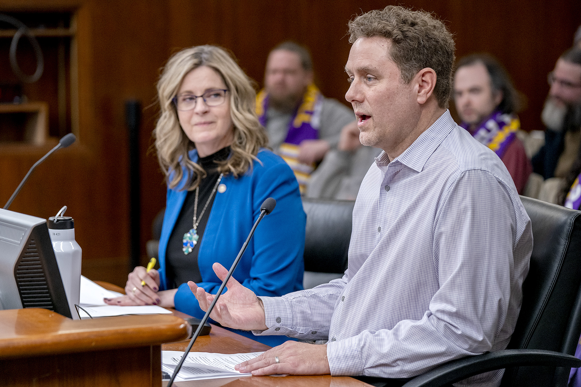 Veyer Logistics General Manager Todd Gaynor testifies before the House Labor and Industry Finance and Policy Committee Thursday on HF3516, sponsored by Rep. Kelly Moller, left. (Photo by Michele Jokinen)